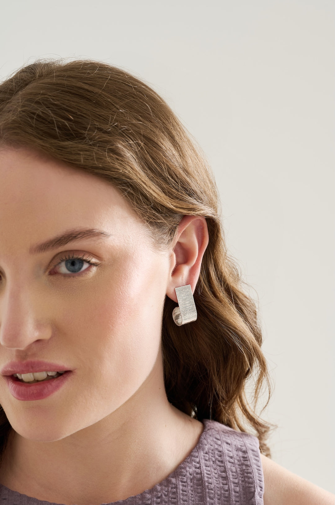 Sterling silver textured long stud earrings